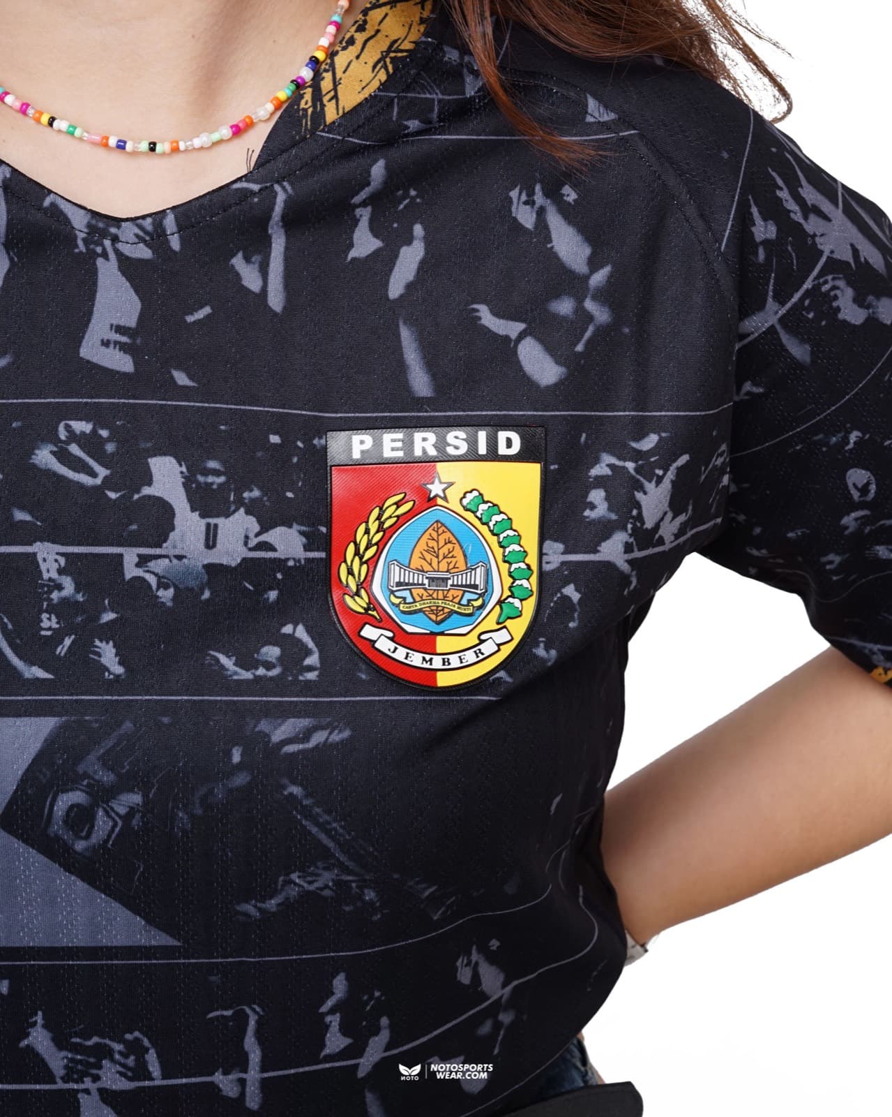 Close-up of the Persid Jember jersey and club crest